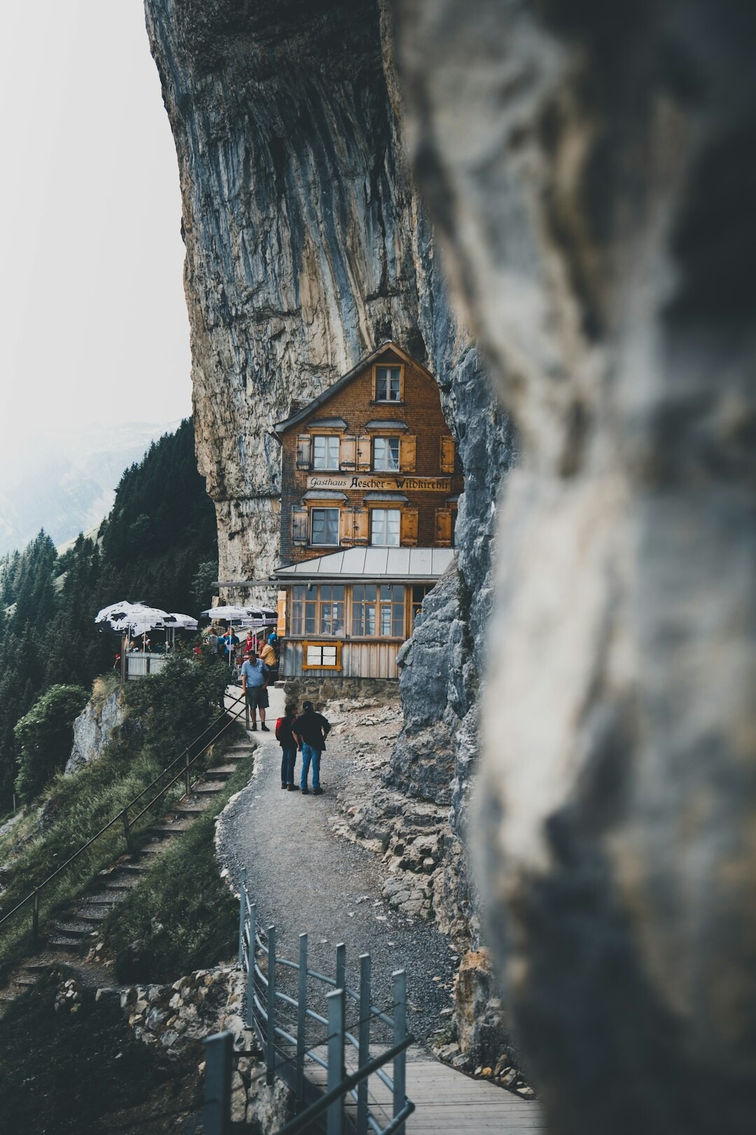 Film crew filming an outdoor advertising commercial in the Swiss Alps